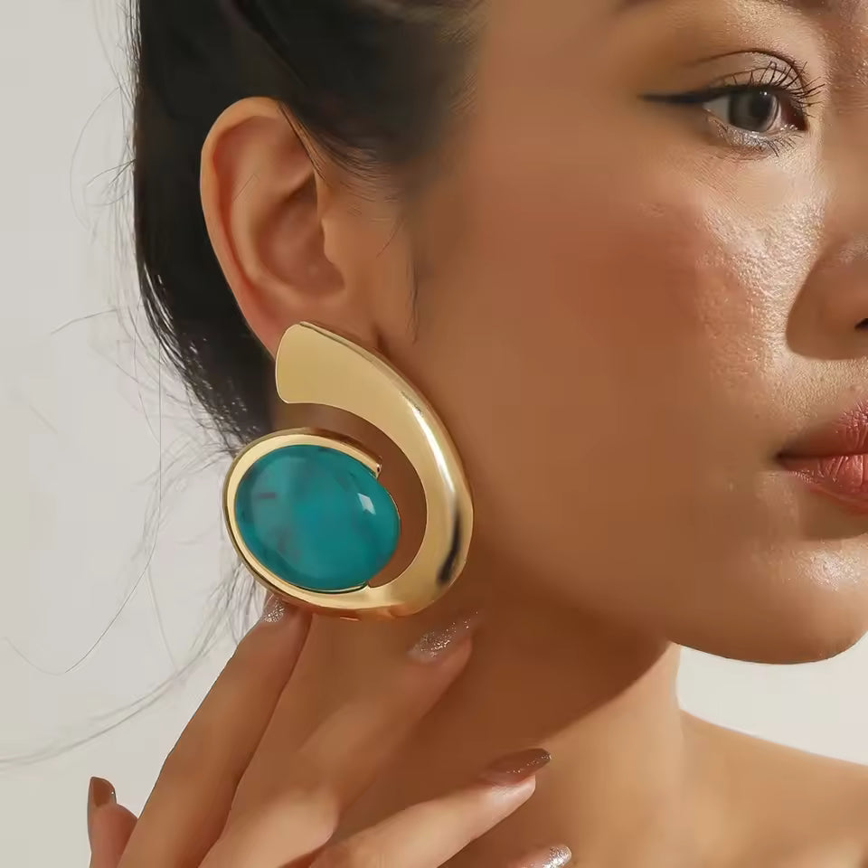 Boucles d'oreilles pendantes géométriques en spirale
