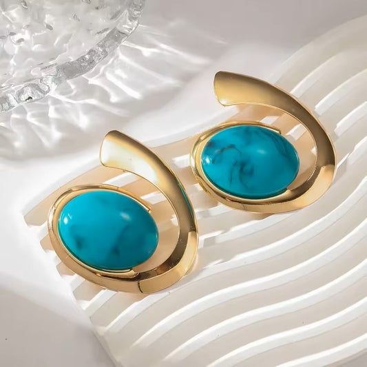 Boucles d'oreilles pendantes géométriques en spirale
